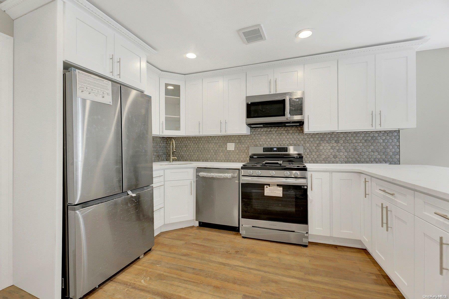 Property Photo:  108-05 221st Street  NY 11429 