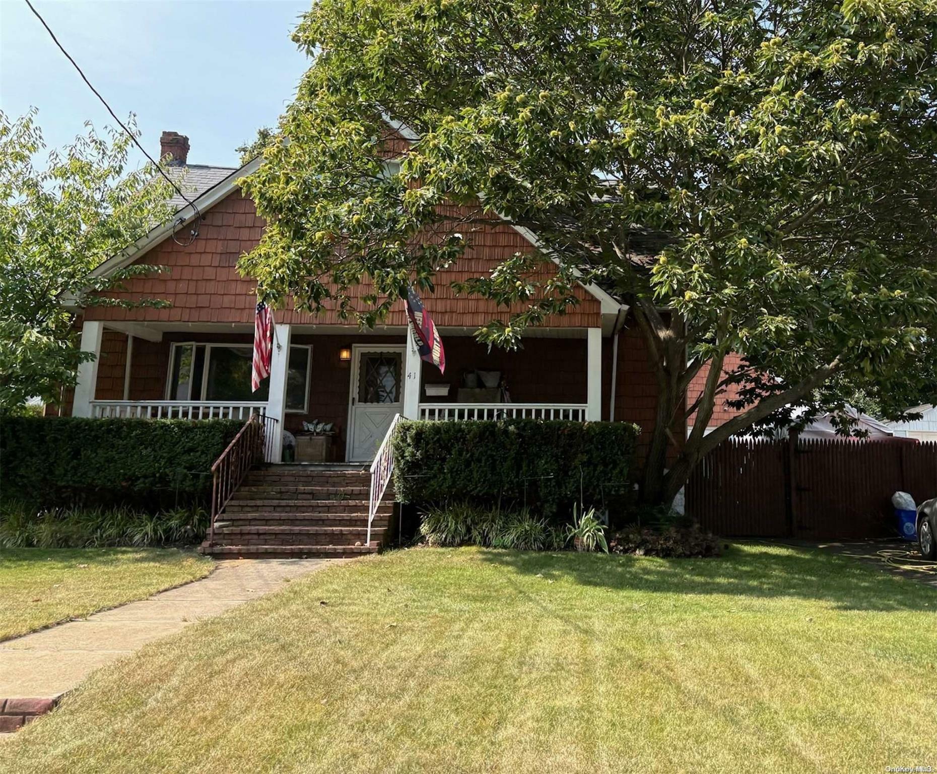 Property Photo:  41 S Oregon Road  NY 11704 