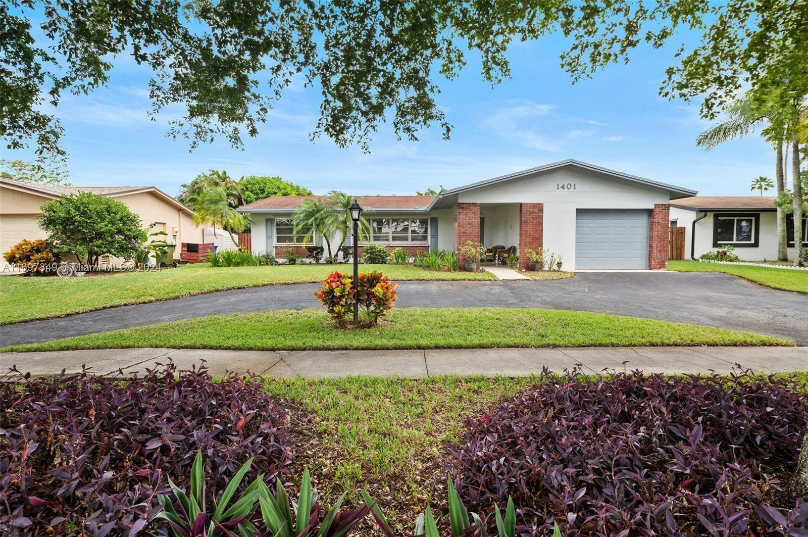 Property Photo:  1401 NW 122nd Ave  FL 33026 