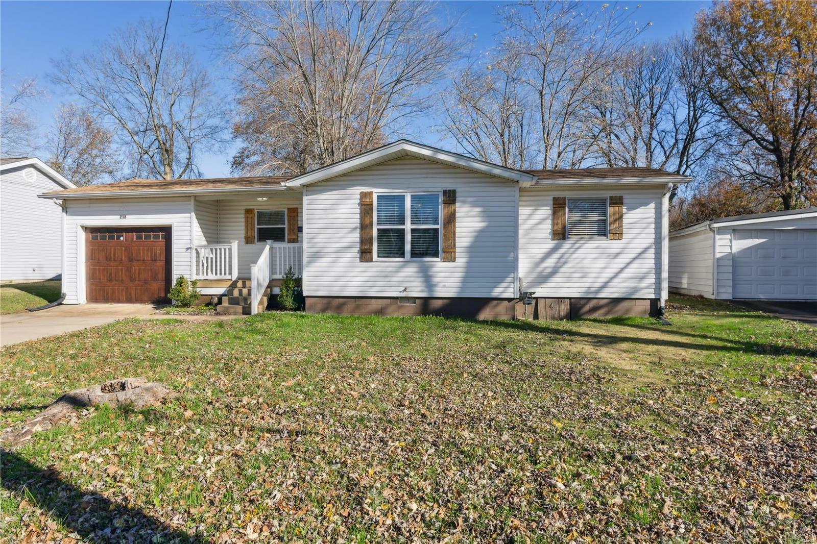 Property Photo:  218 N Alexander N  MO 63640 