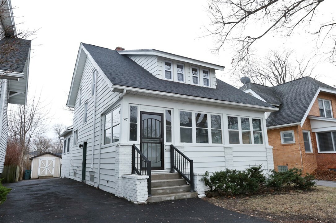 Property Photo:  147 Scottsville Road  NY 14611 