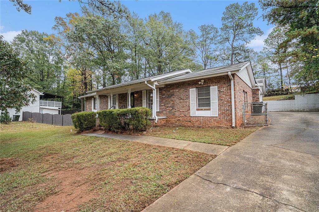 Property Photo:  1002 Millwood Drive SW  GA 30008 