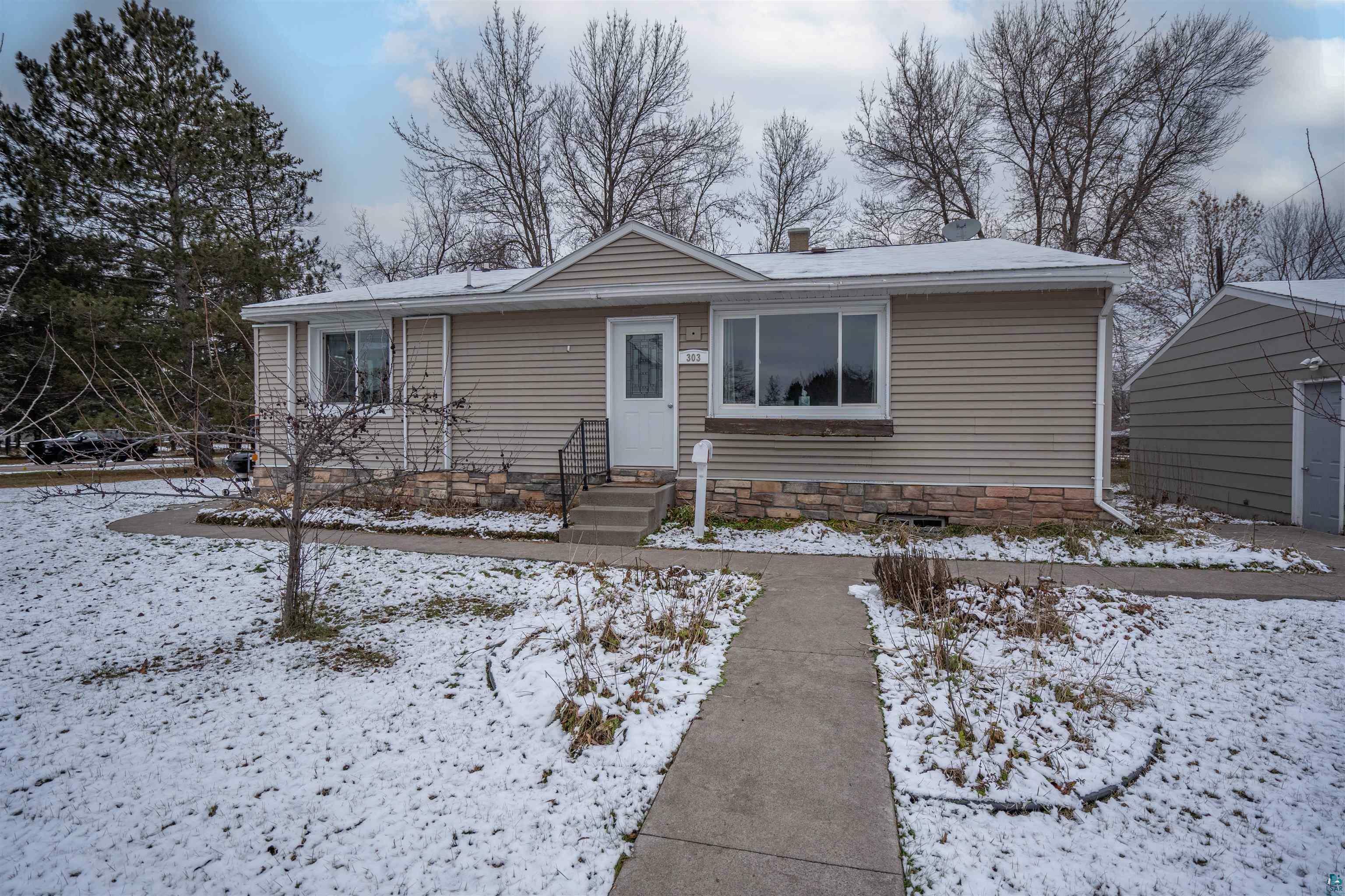 Property Photo:  303 E McCuen St  MN 55808 