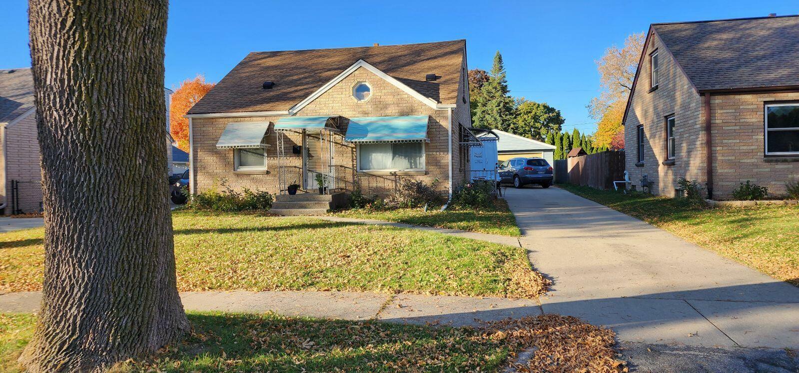 Property Photo:  406 W Allerton Ave  WI 53207 