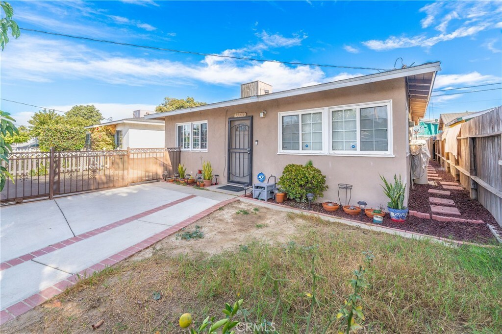 Property Photo:  15330 Oliva Avenue  CA 90723 