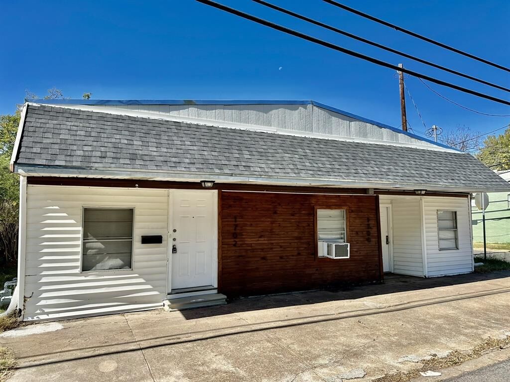 Property Photo: 1700 S Travis Street 1702 TX 75090