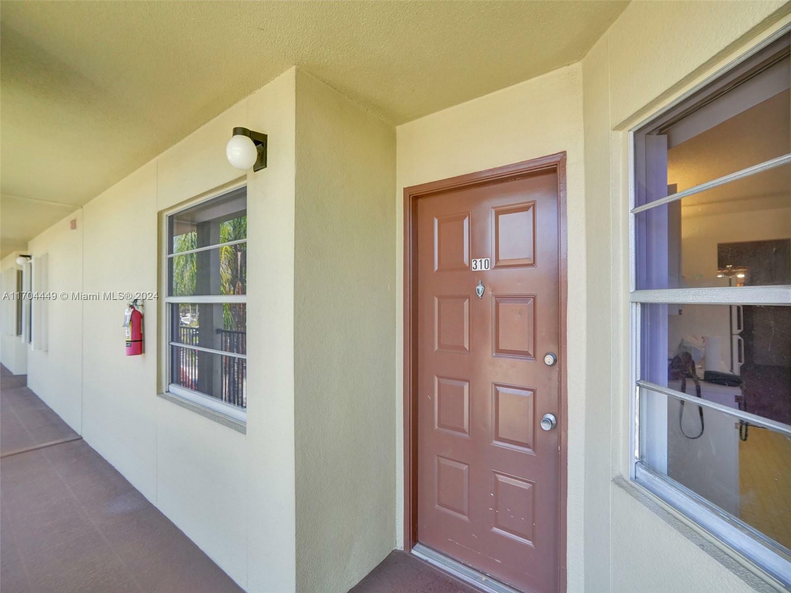 Property Photo:  13000 SW 15th Court 310U  FL 33027 