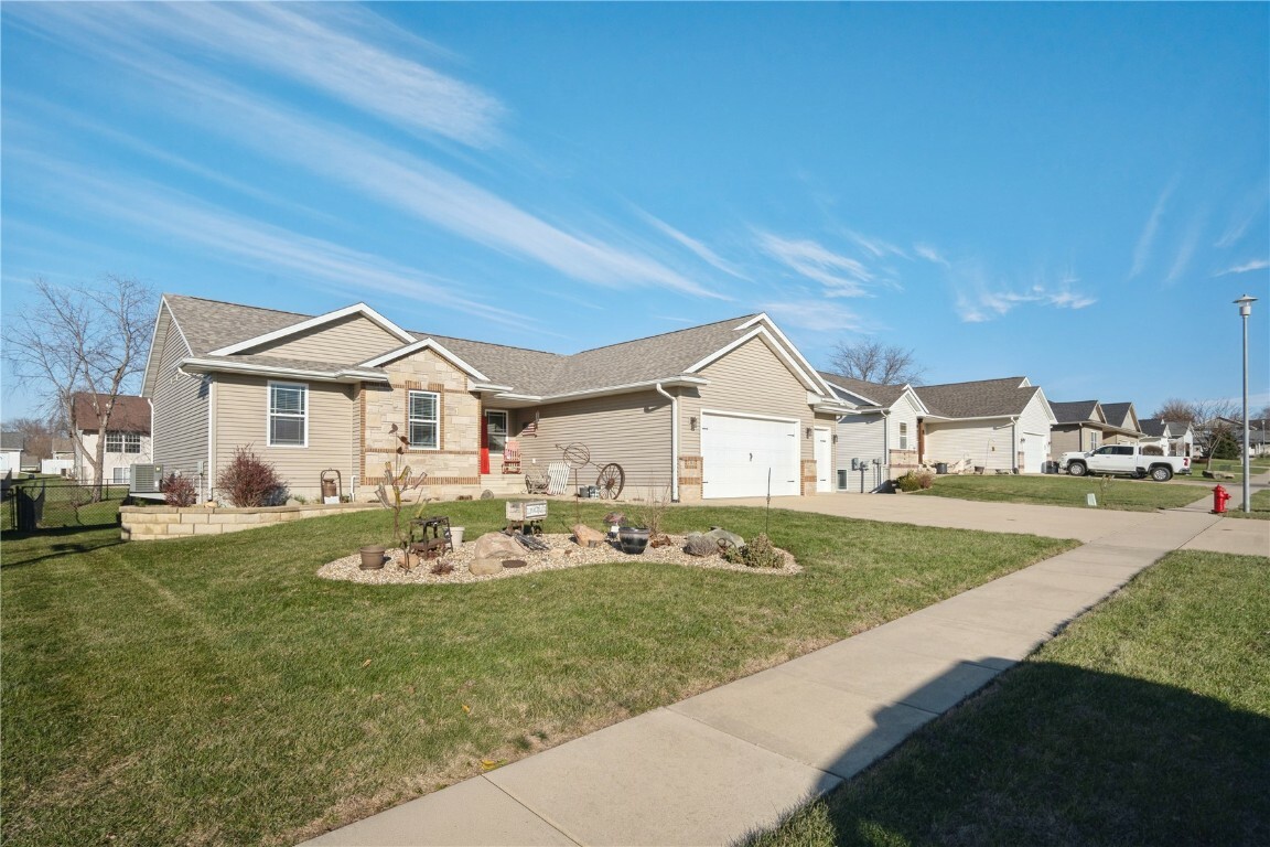 Property Photo:  201 N Hill Crest Circle  IA 52213 