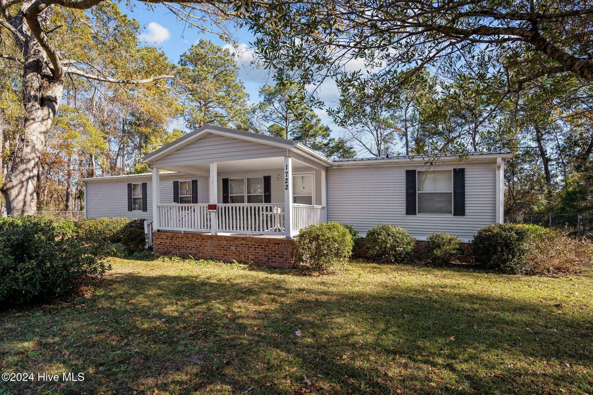 Property Photo:  1722 Balsam Drive SW  NC 28462 