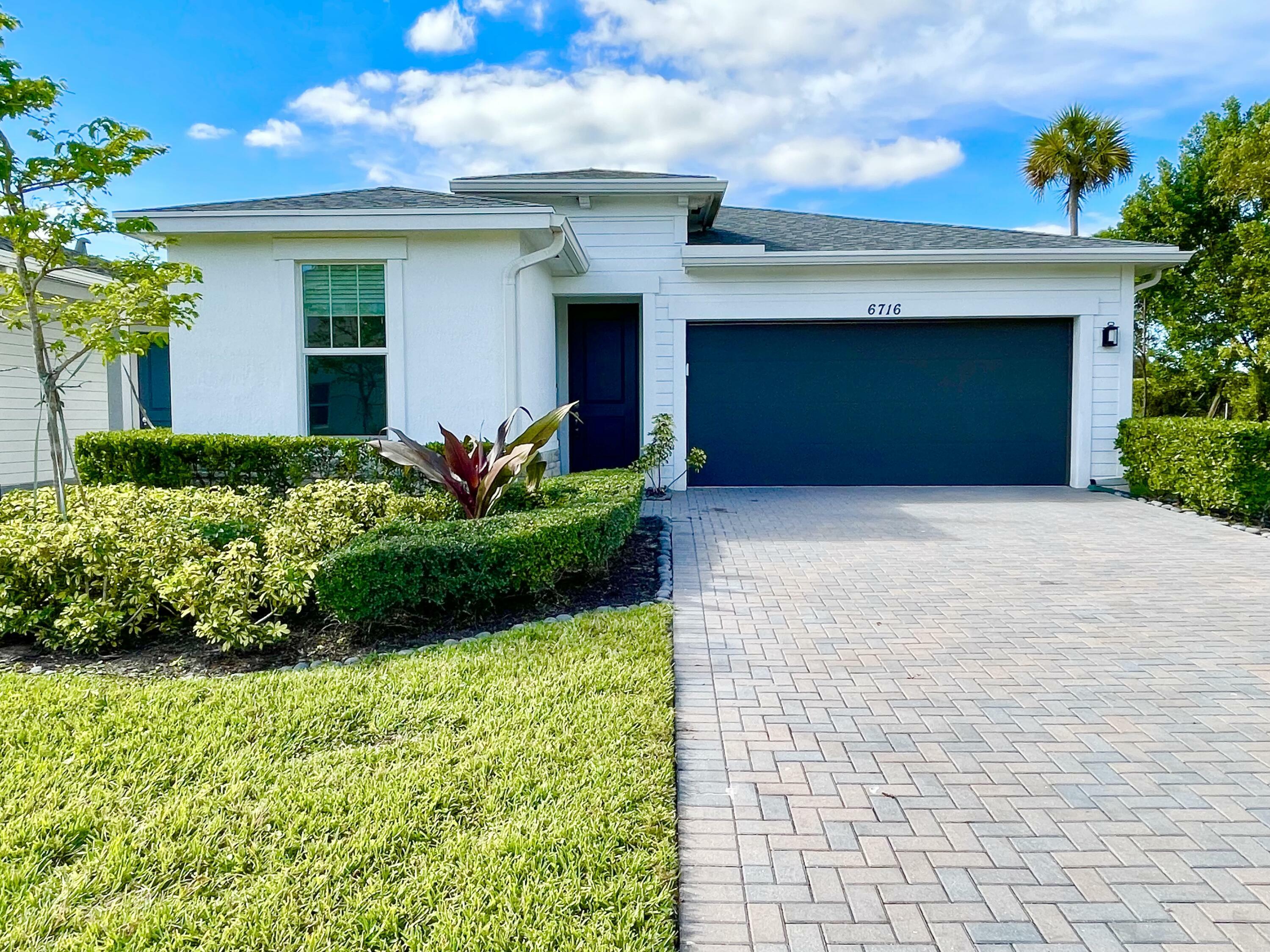 Property Photo:  6716 Pointe Of Woods Drive  FL 33413 