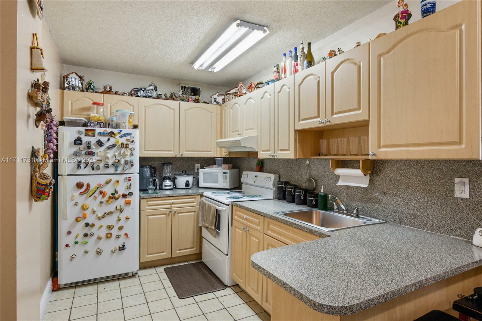 Property Photo:  16465 NE 22nd Ave 120  FL 33160 