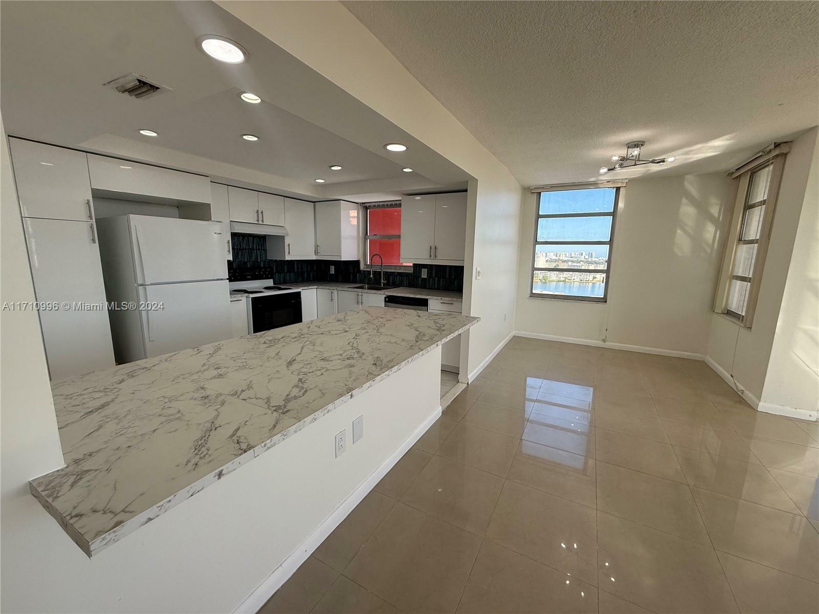 Property Photo:  1301 NE Miami Gardens Dr 1615W  FL 33179 