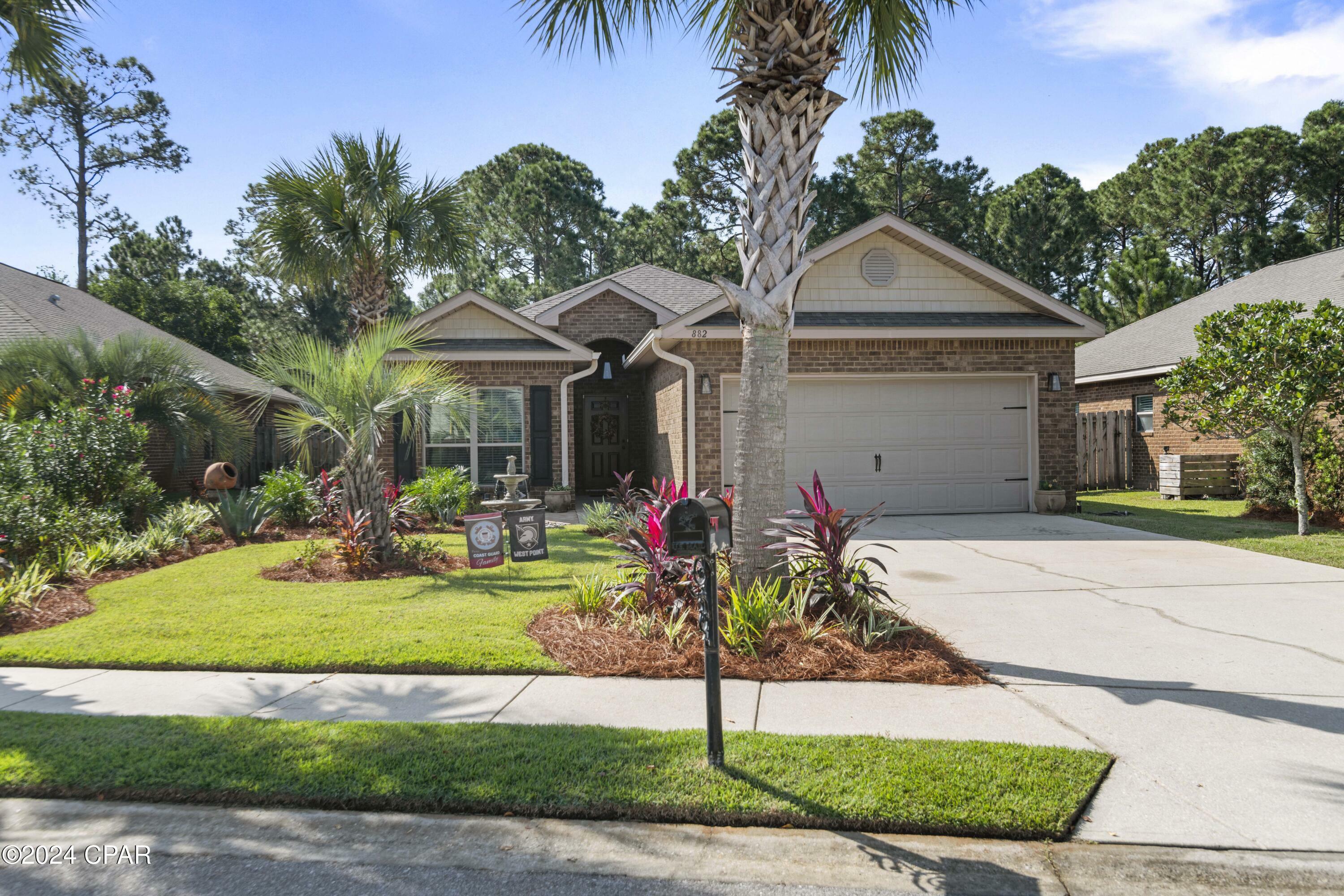 Property Photo:  882 Cocobolo Drive  FL 32459 