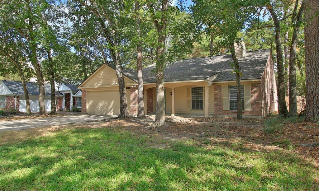 Property Photo:  175 Sandpebble Drive  TX 77381 