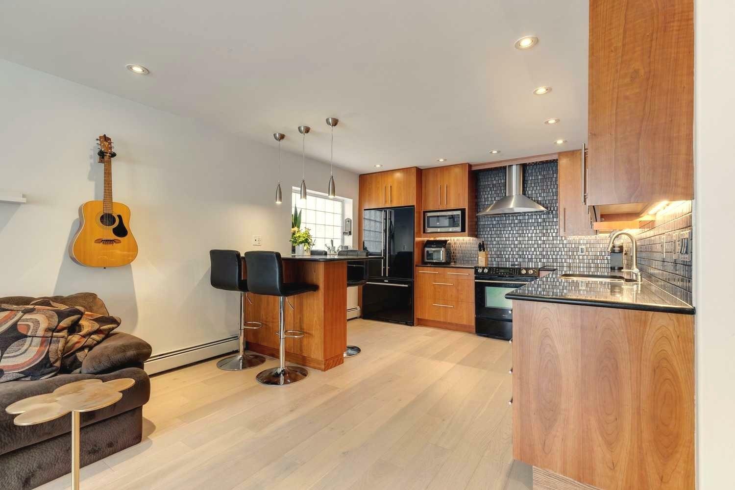 Property Photo:  1611 26 Avenue SW 3  AB T2T 1C7 