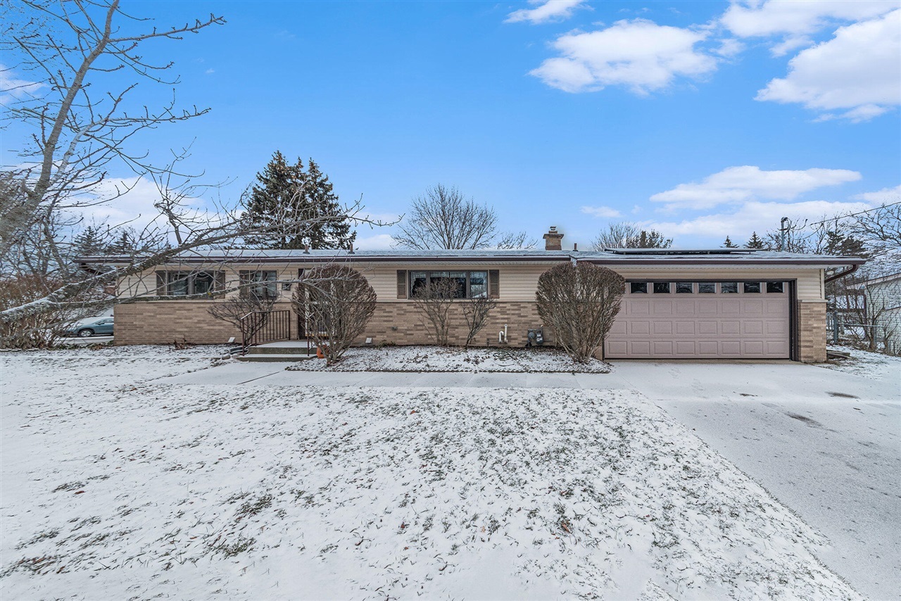 Property Photo:  4114 Sawkaw Drive  MI 49525-1858 