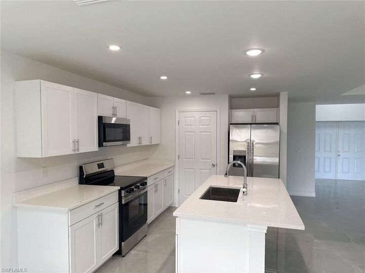 Property Photo: 3705 26th St SW FL 33976