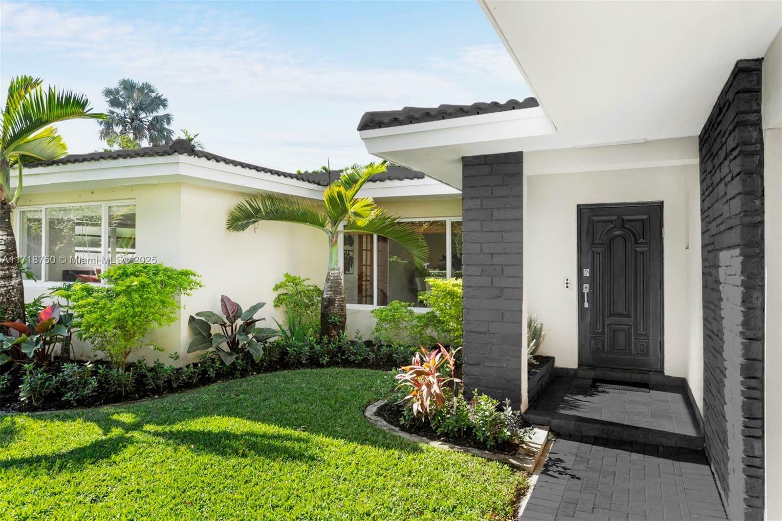 Property Photo:  6140 Pine Tree Drive  FL 33140 