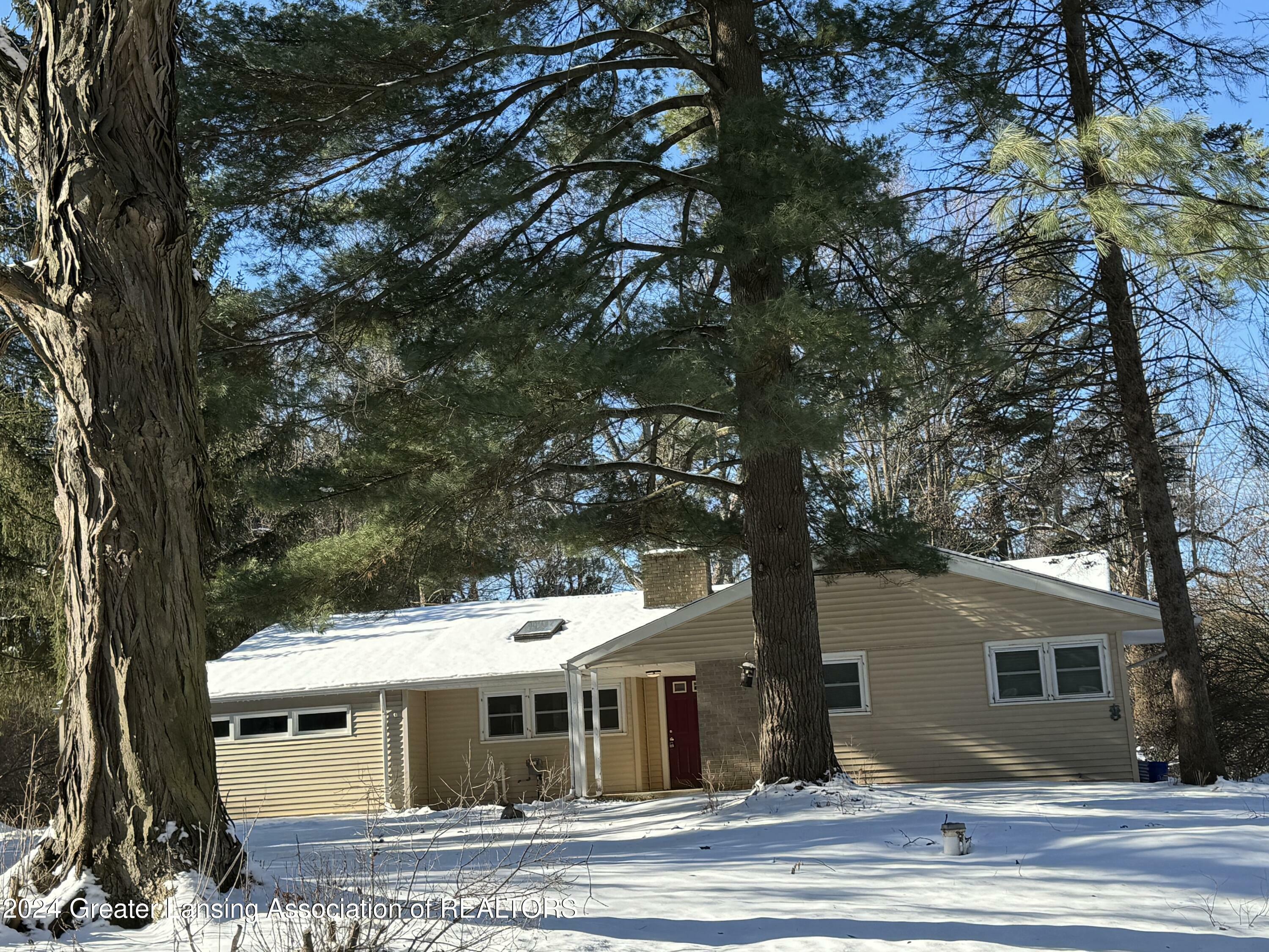 Property Photo:  4589 Van Atta Road  MI 48864 