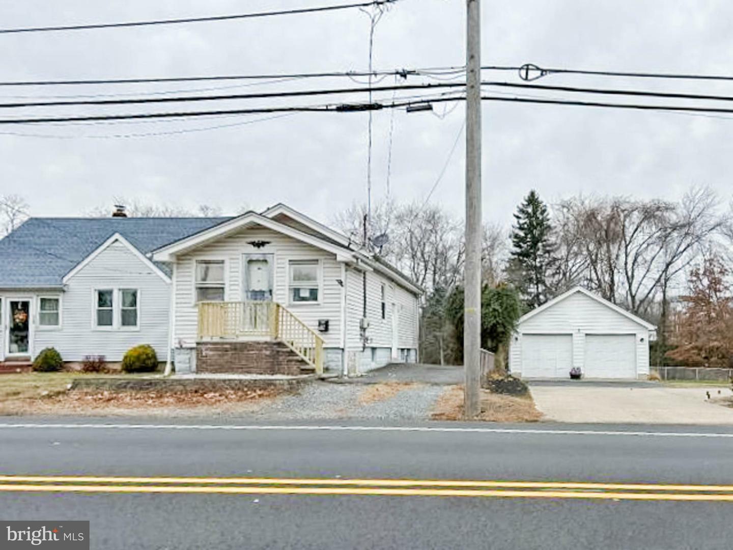 Property Photo:  58 Manalapan Road  NJ 08884 