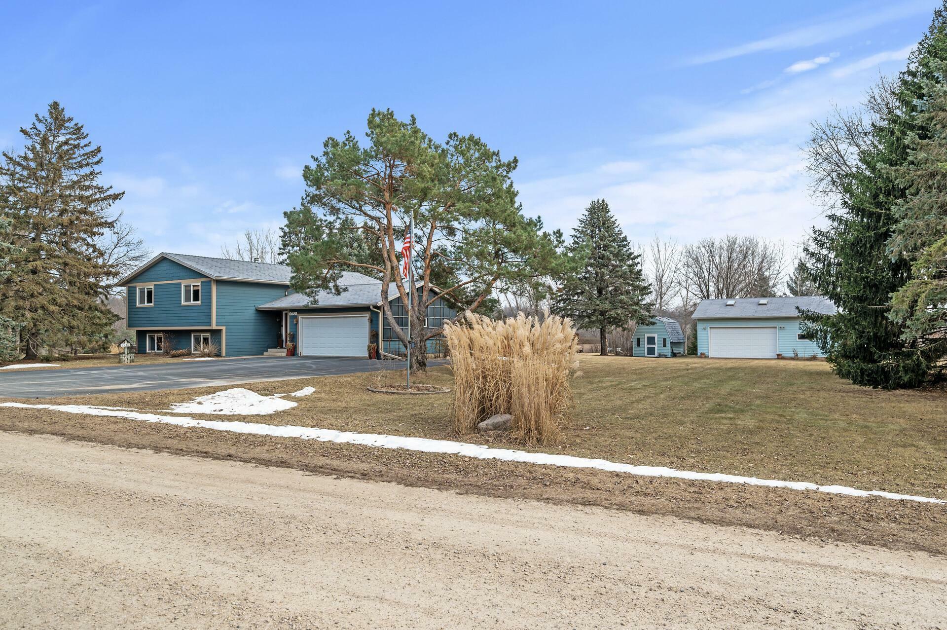 Property Photo:  9938 Rich Valley Boulevard  MN 55077 