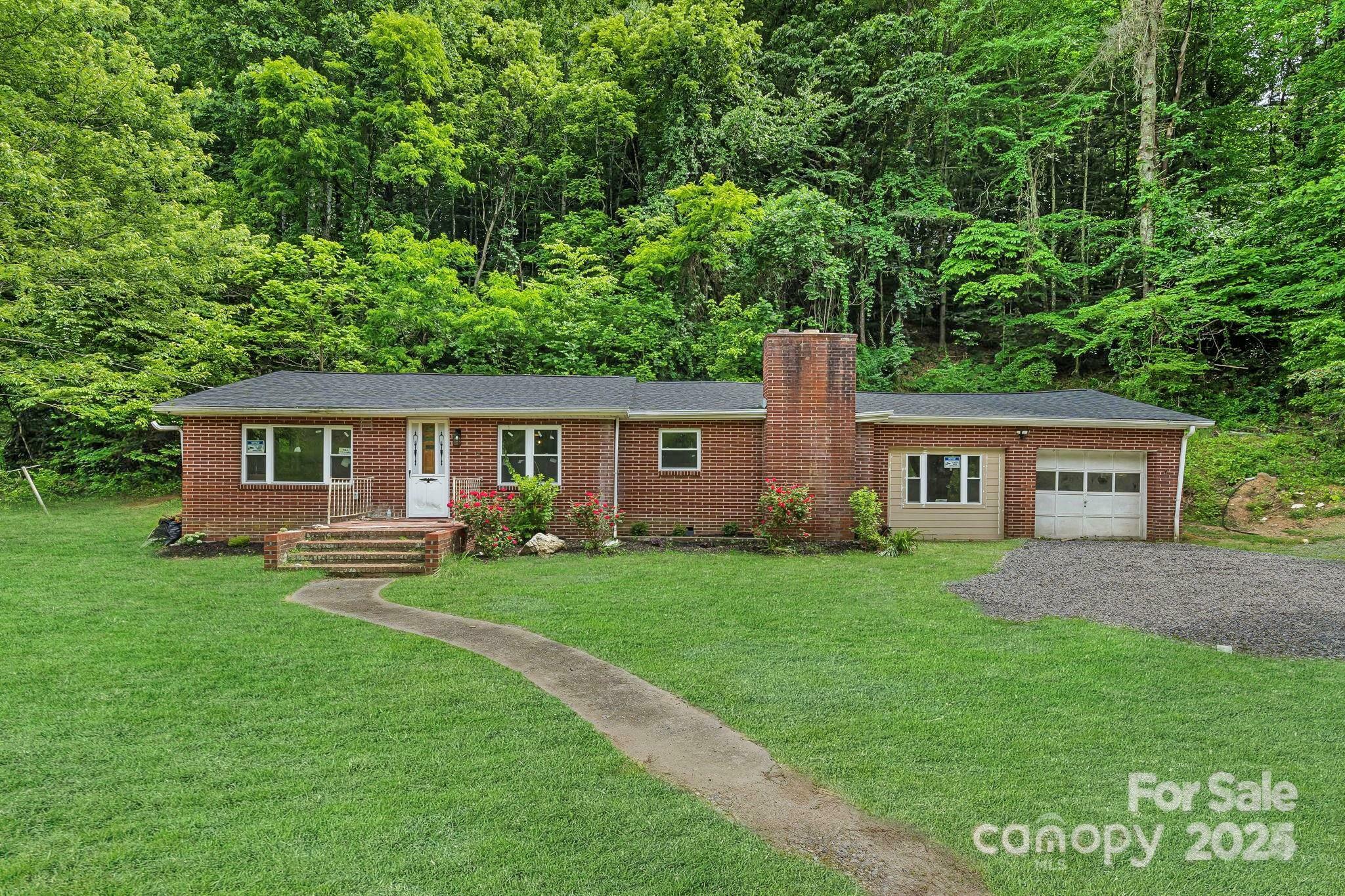 Property Photo:  234 Fletcher Martin Road  NC 28701 