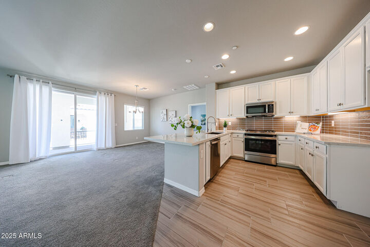 Property Photo:  14200 W Village Parkway 113  AZ 85340 