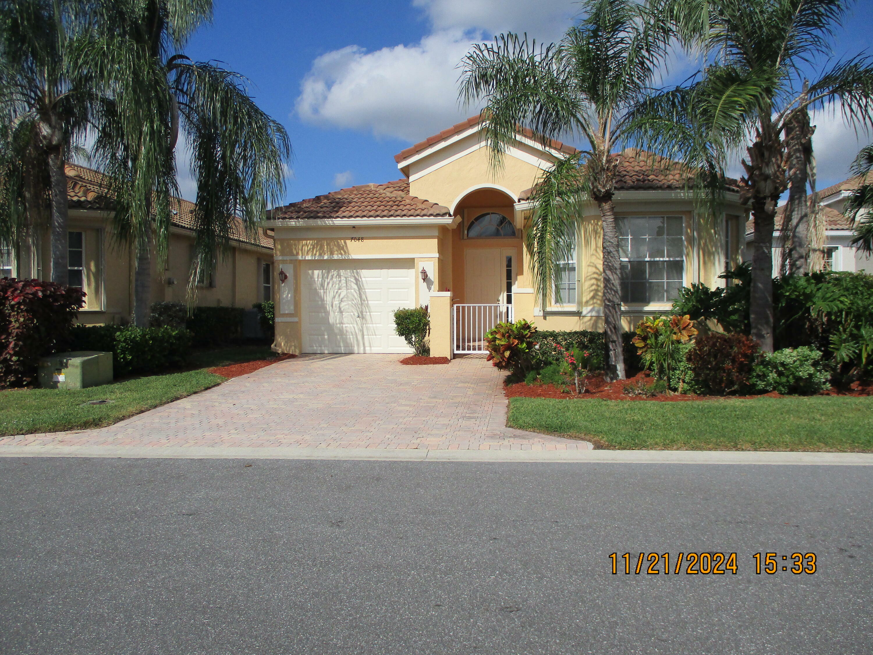 Property Photo:  7048 Cataluna Circle  FL 33446 