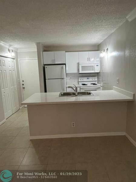 Property Photo:  2701 Riverside Dr 306-B  FL 33065 