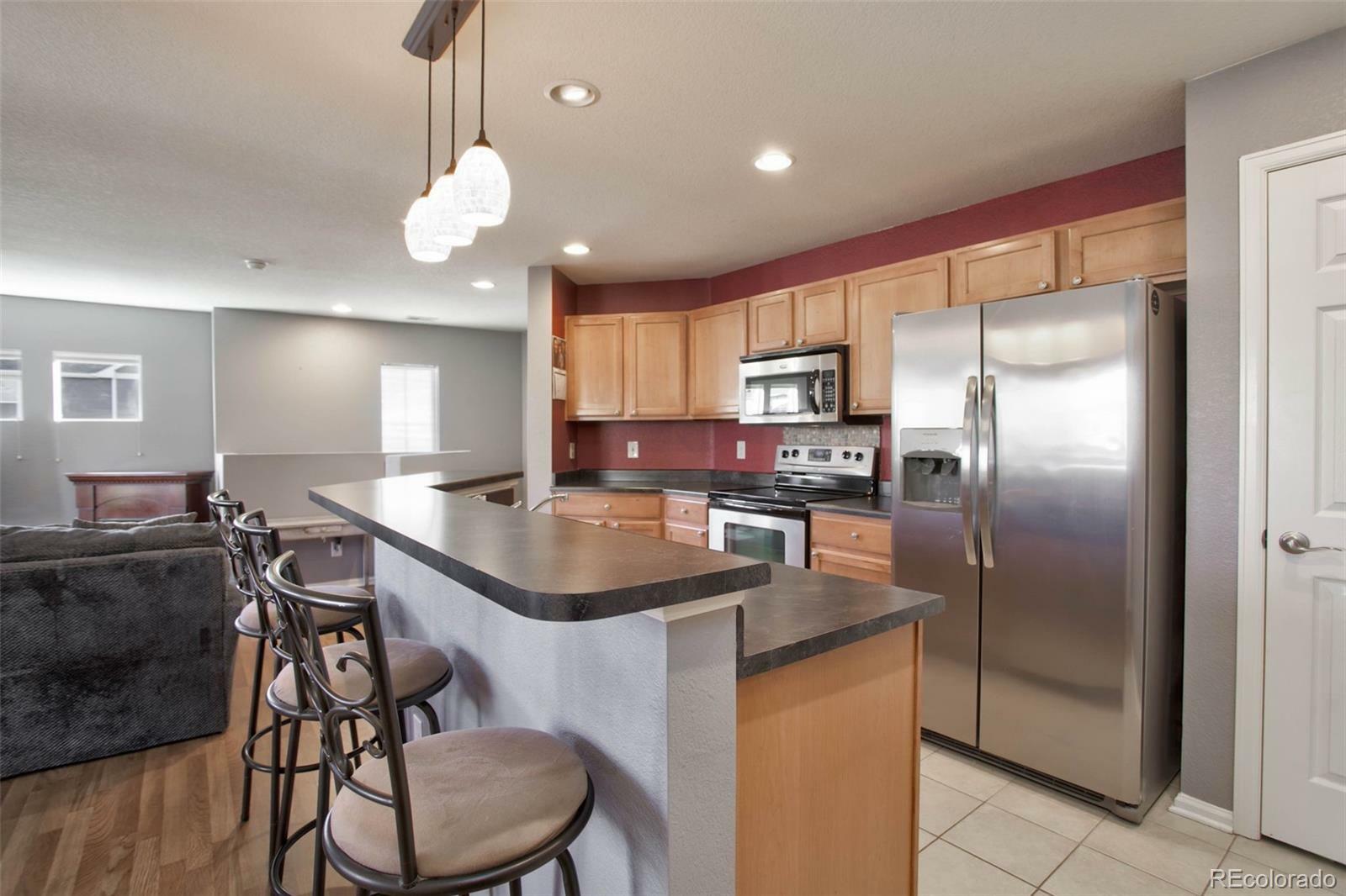 Property Photo:  11844 Oak Hill Way A  CO 80640 