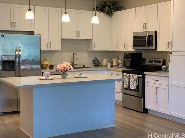 Property Photo:  91-3524 Iwikuamoo Street 203  HI 96706 
