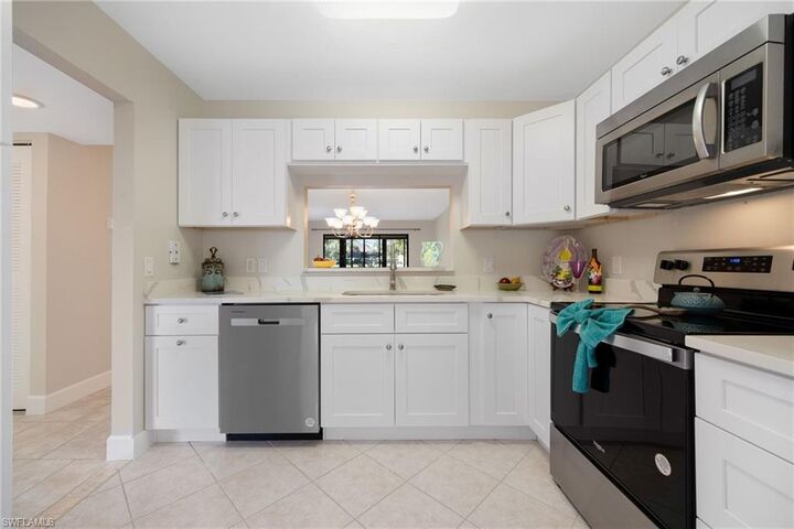 Property Photo: 15464 Admiralty Cir 6 FL 33917