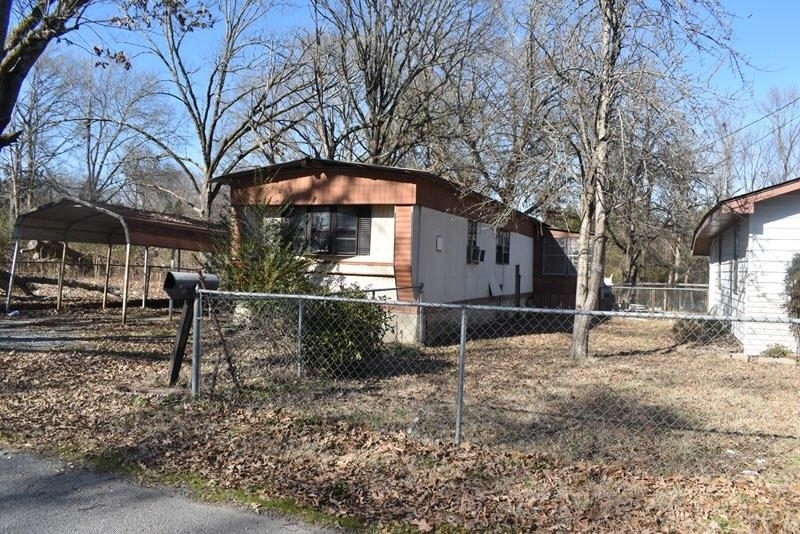 Property Photo:  5801,05,07 Womack  AR 71601 