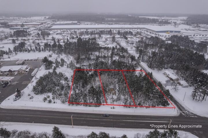 Property Photo: 7403 Schofield Avenue 7407-7411 WI 54476