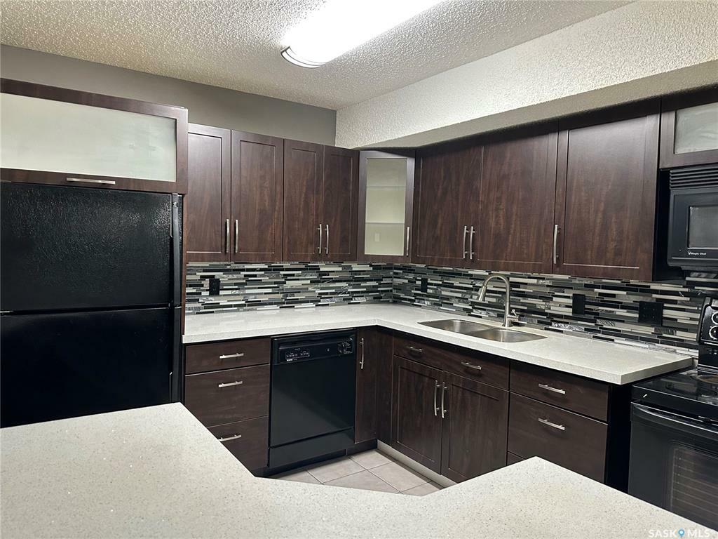 Property Photo:  225 Kingsmere Boulevard 204  SK S7J 4J6 