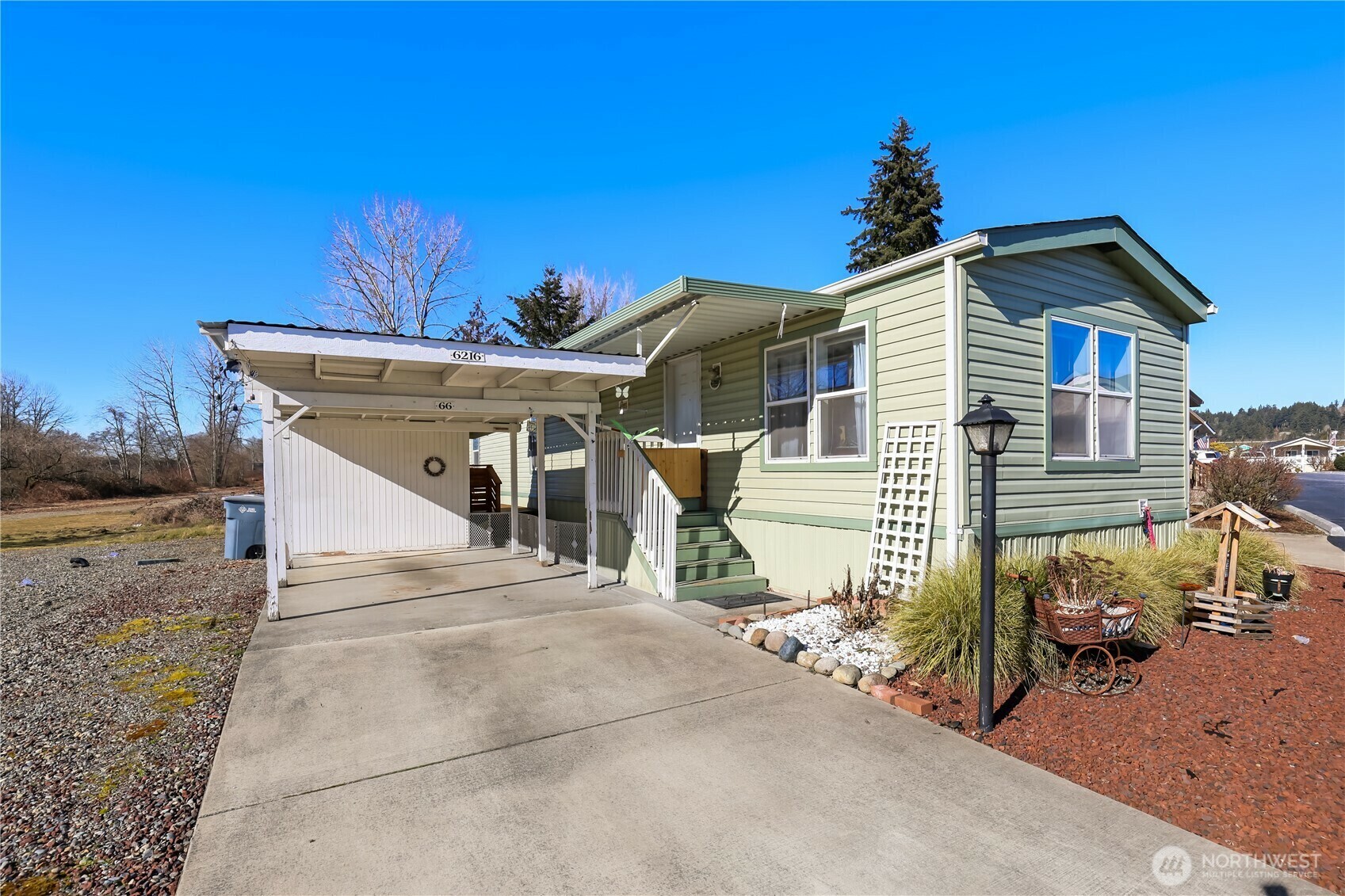 Property Photo:  6216  105th Avenue Ct E 66  WA 98372 