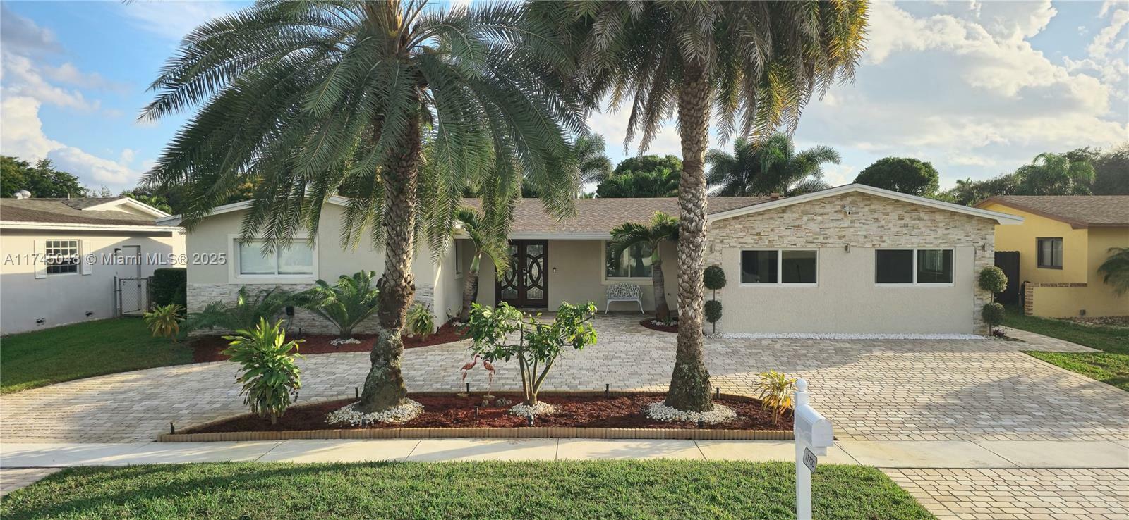 Property Photo:  11700 NW 15th Ct  FL 33026 