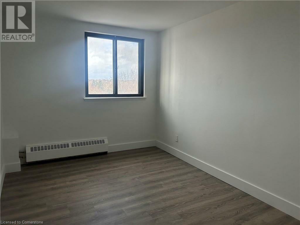 Property Photo: 671 Woolwich Street 602 ON N1H 3Y9
