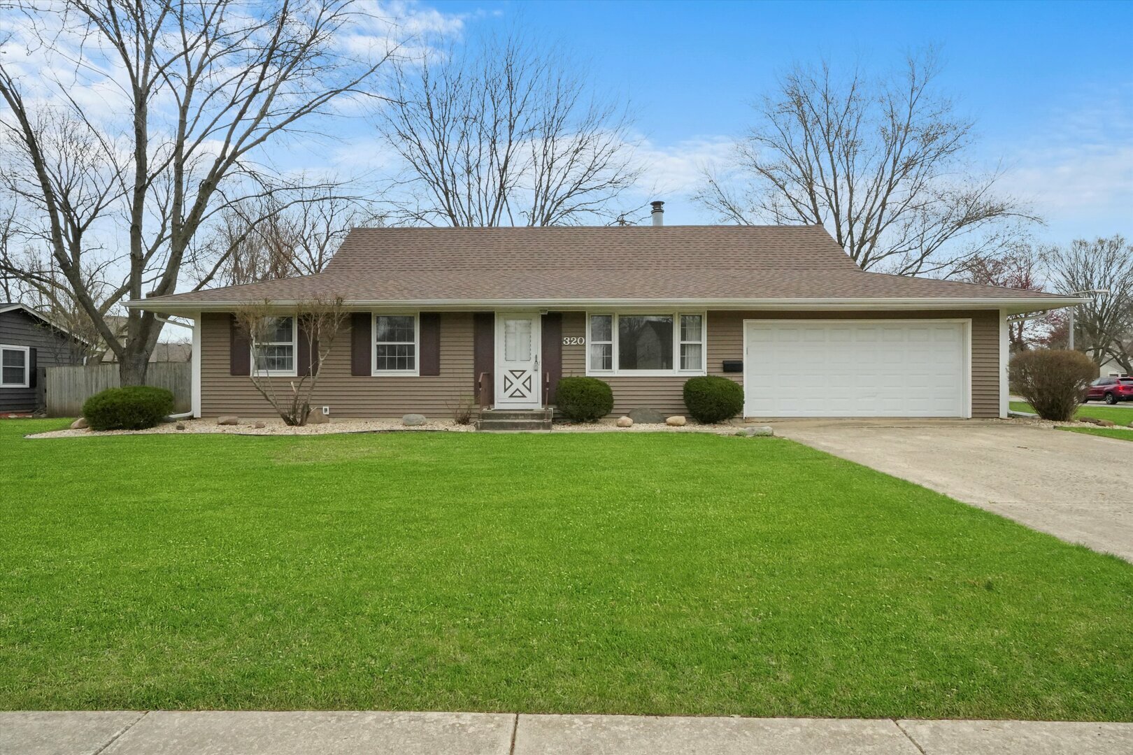 Property Photo: 320 Boulder Hill Pass IL 60543