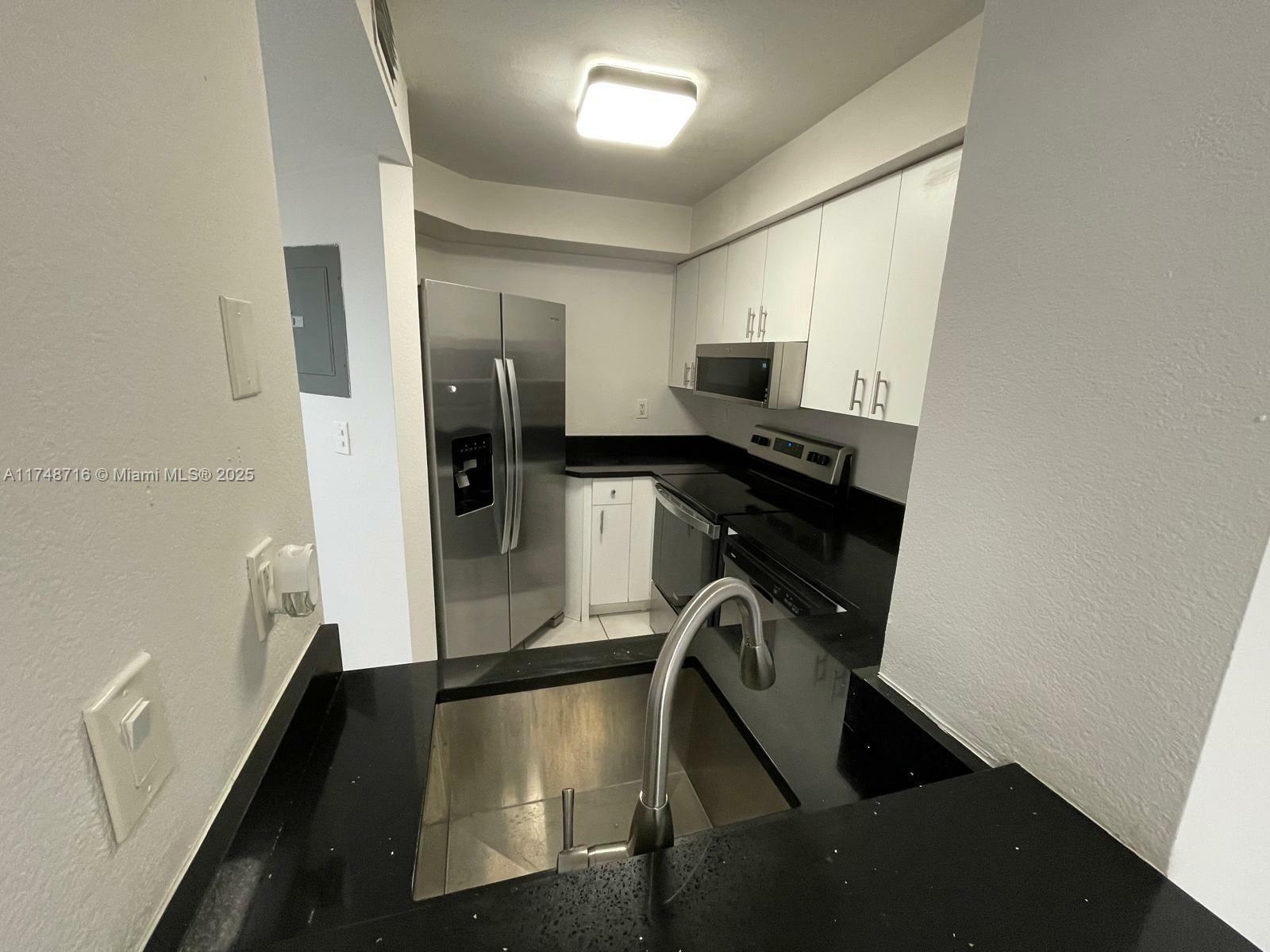 Property Photo:  8275 SW 152nd Ave D-102  FL 33193 