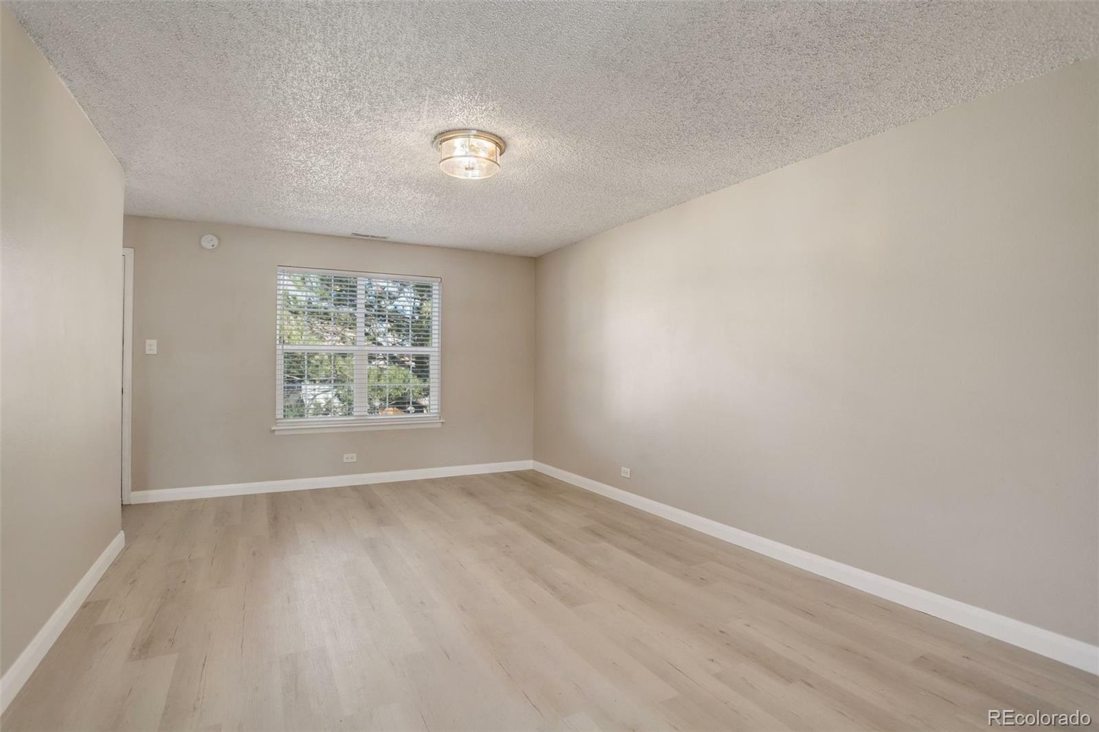 Property Photo:  7165 S Gaylord Street E09  CO 80122 