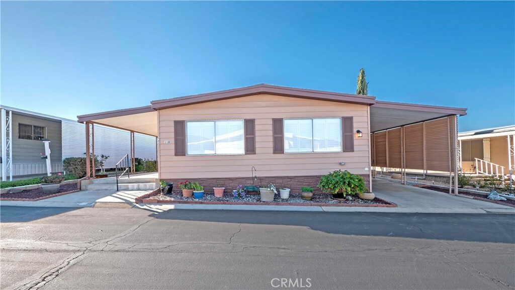 Property Photo: 35218 Fir Avenue 118 CA 92399