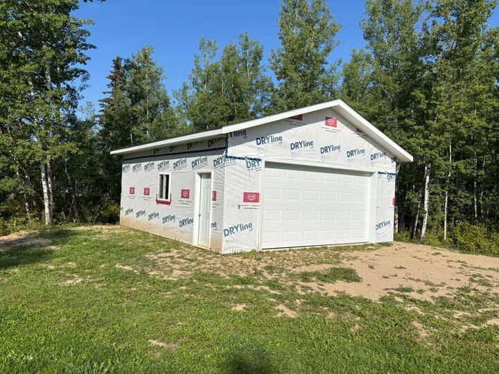 Property Photo: 660022 - Range Road 225.5 (Unit 57) #222 AB T9S 1C4