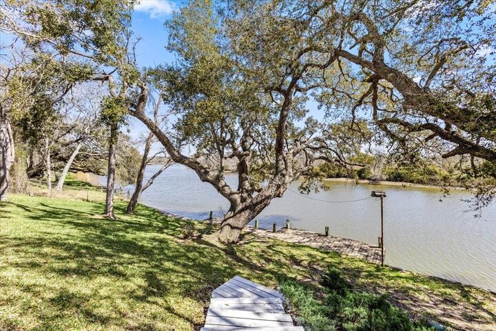 Property Photo: 483 Riverside Drive TX 77465