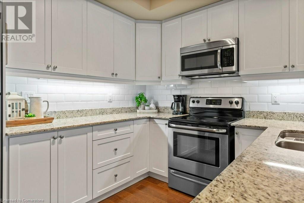 Property Photo: 539 Belmont Avenue West 1004 ON N2M 0A2