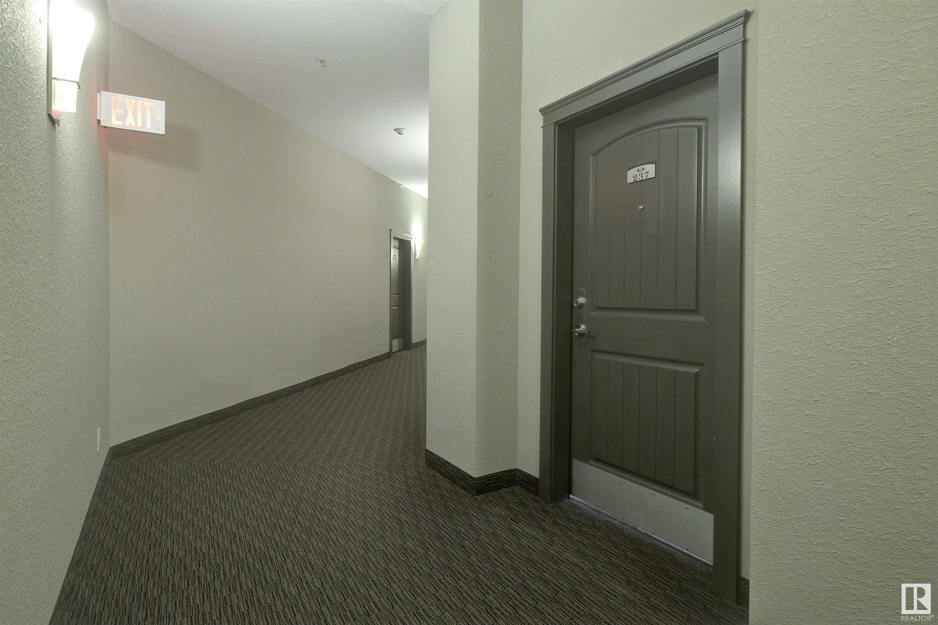 Property Photo: 6079 Maynard Way NW 237 AB T6R 0S5