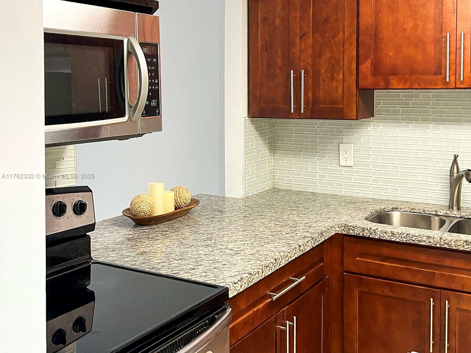 Property Photo: 211 NE 8th Ave 107 FL 33009
