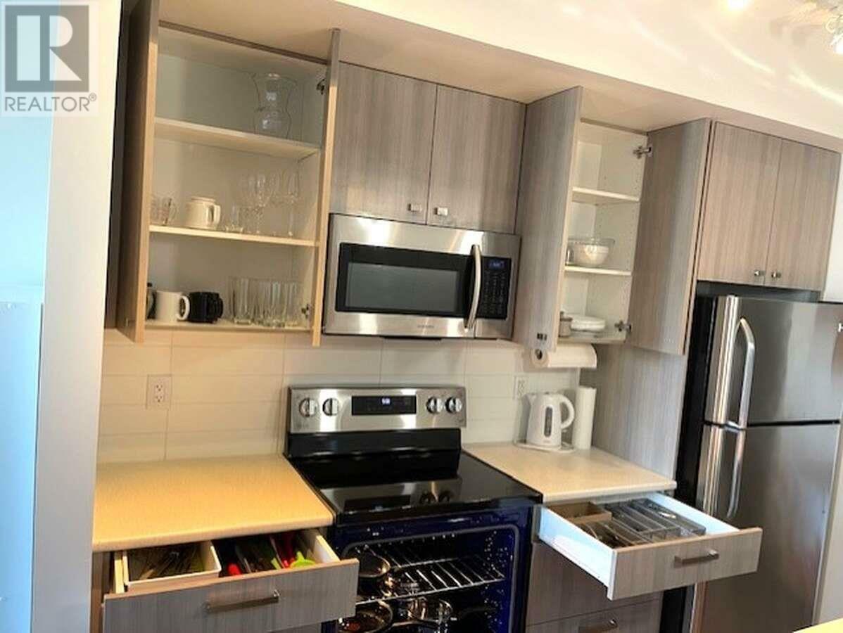 Property Photo: 935 Academy Way 207 BC V1V 3C9