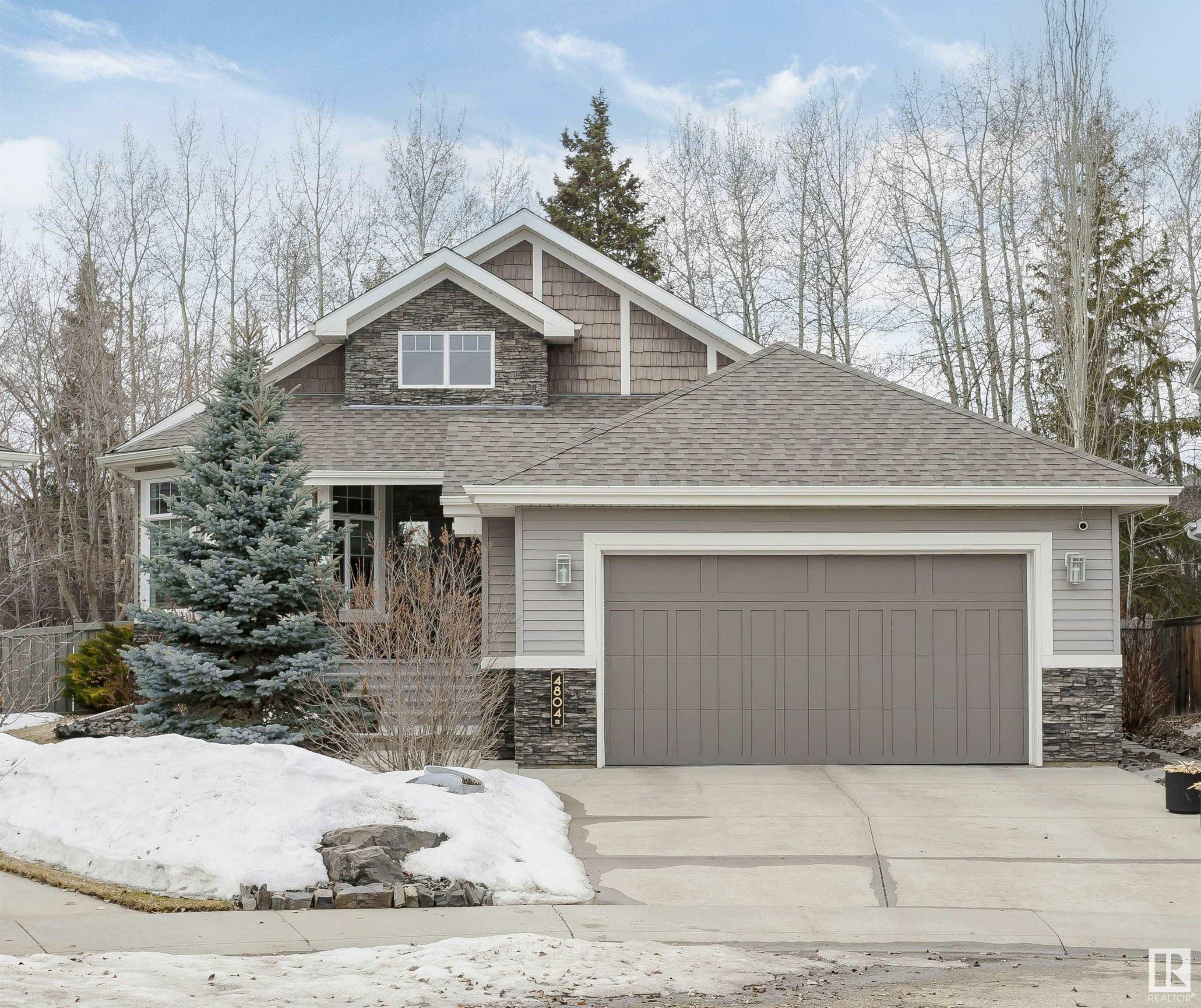 Property Photo: 4804 212 Street NW AB T6M 0G2
