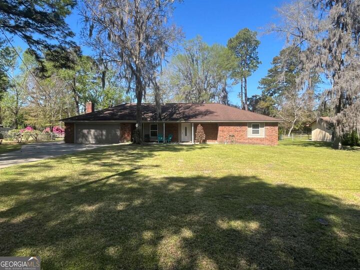 Property Photo:  411 Woodland Drive  GA 31313 